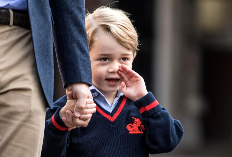  He seemed nervous as he held his dad's hand and brushed his face with his hand this morning