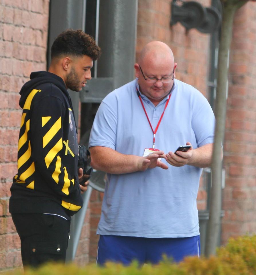  The former Arsenal man was happy to take a photo with a fan, but wasn't too pleased when he had trouble with his phone