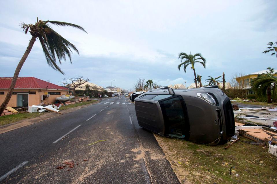  A car turned onto its side in Marigot, near the Bay of Nettle, on the French side of St Martin