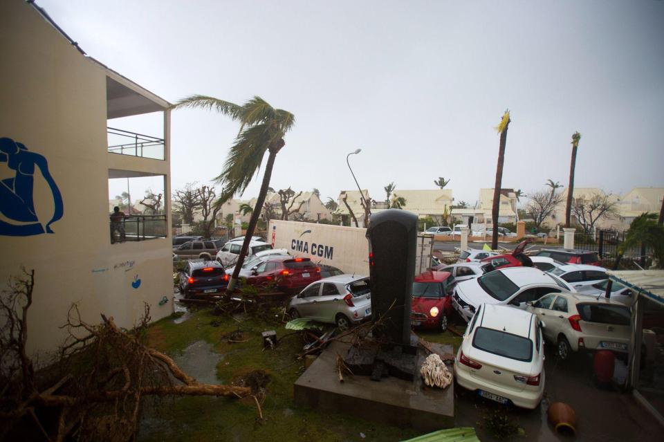  Parked cars were thrown around like rag dolls during the powerful hurricane