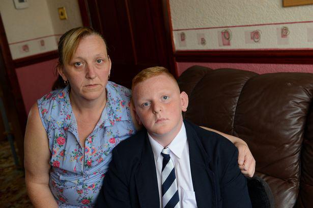  Lisa Humphrey is furious that her son Harry, pictured together, was put in isolation because of his haircut