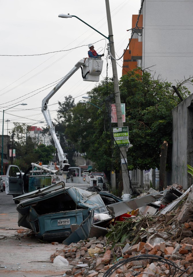 A heavily damaged street in the eastern area of Mexico City after a 8.2 earthquake