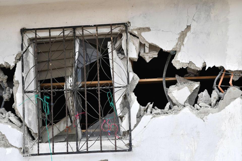  A wall is ripped in two by the earthquake that struck Mexico this morning