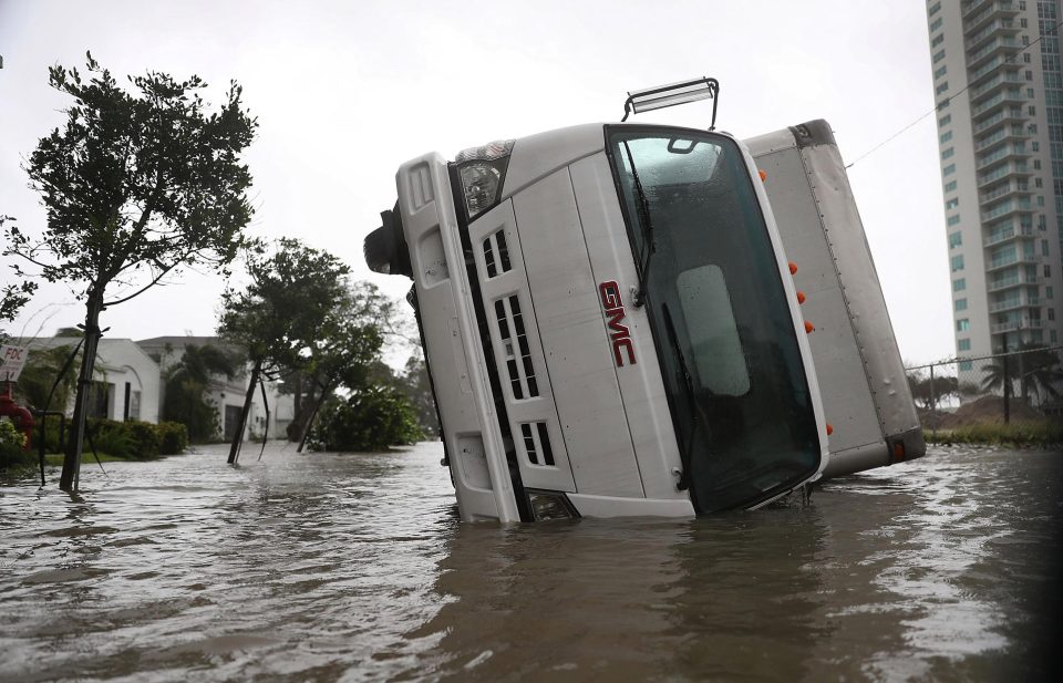  A truck is seen on its side after being blown over as Hurricane Irma passed in Miami