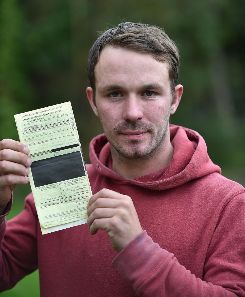 Arron Hughes with his fine from the USA after he swam across the Colorado River at the top of the Hoover Dam