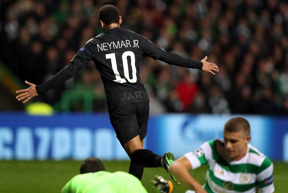  The former Barcelona star celebrates after netting the opener against Celtic in the Champions League