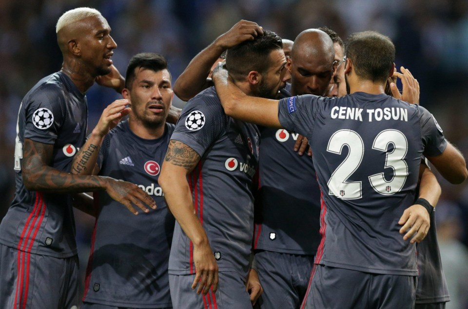 Besiktas team-mates help ex-Liverpool defender Ryan Babel celebrate his clincher at Porto