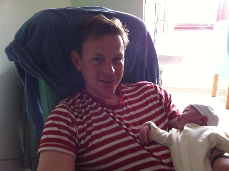  David pictured with a newborn Sebastian