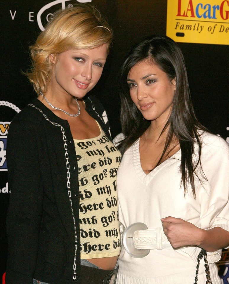  Paris and her then-assistant Kim Kardashian pose on the red carpet together at The Lakers Casino launch