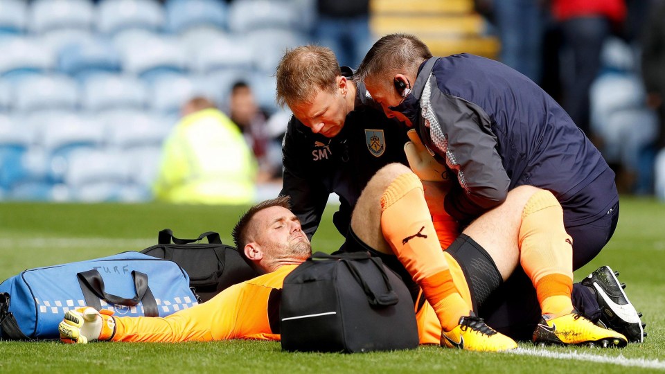 Clarets keeper Tom Heaton is left in agony with his shoulder injury