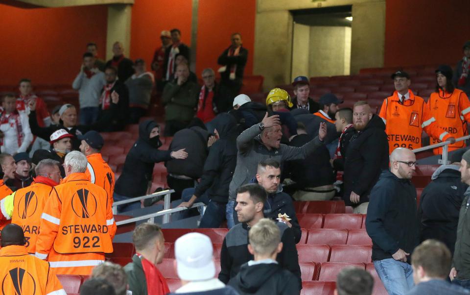 Arsenal have been charged over failing to keep the stairways clear in the away section