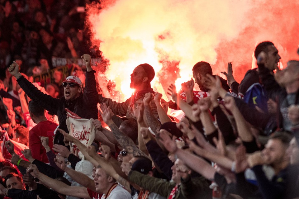 Flares were let off inside the ground as Cologne fans rampaged around