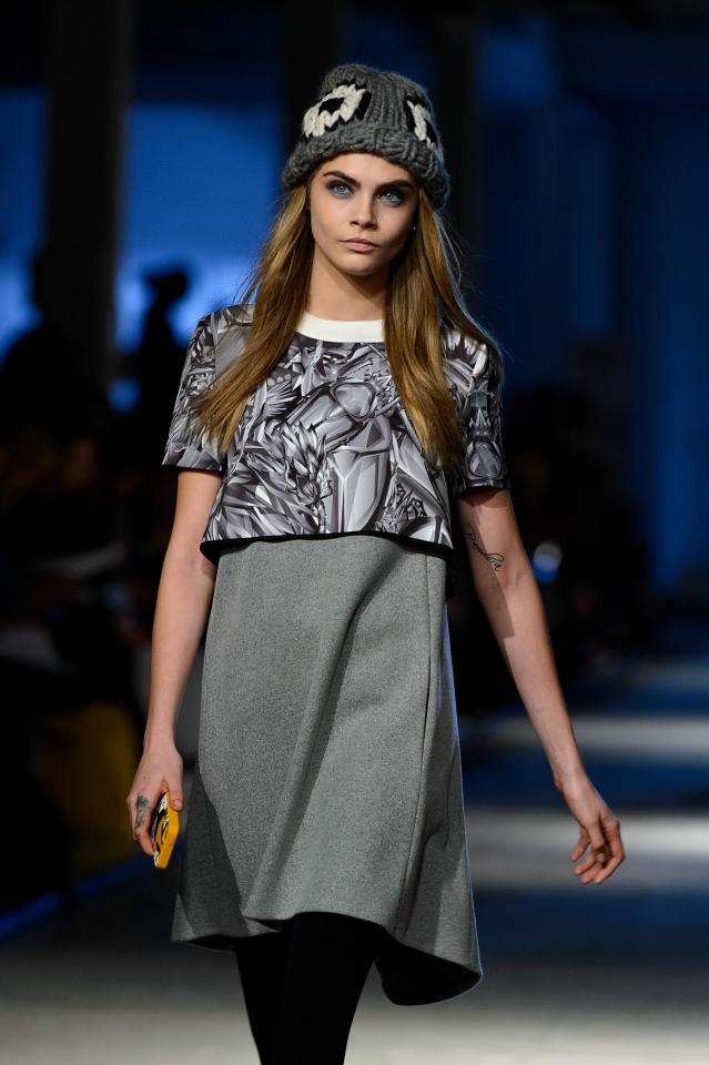  Cara Delevingne took the first ever catwalk selfie during the Giles Deacon show at London Fashion Week in 2014