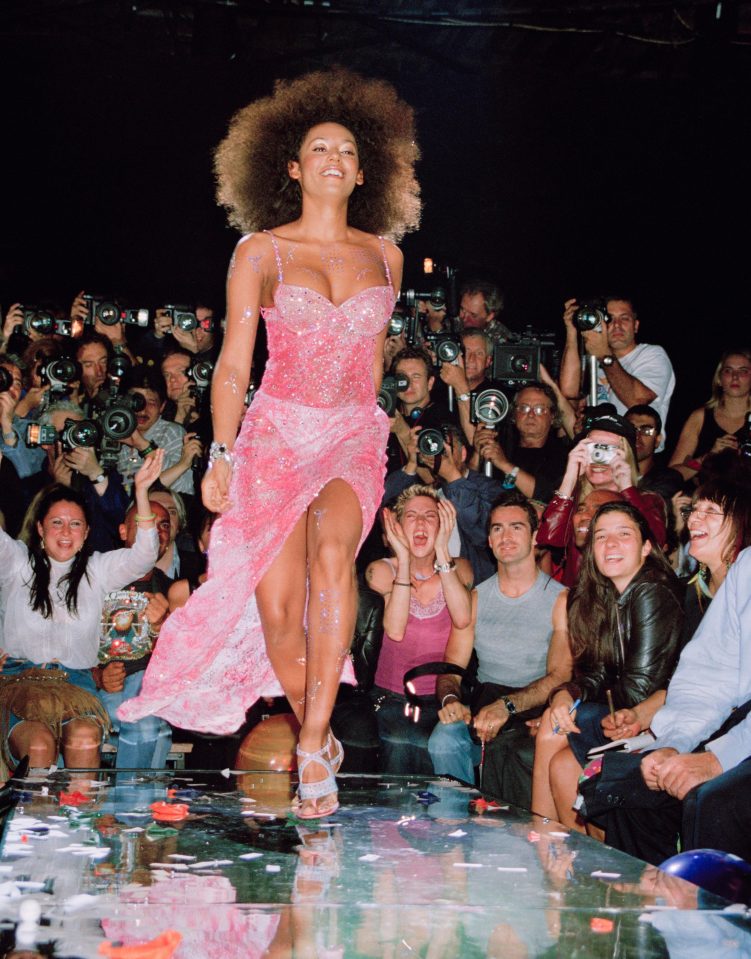  Melanie Brown storms down the Julien Macdonald runway in 1999, cheered on by her Spice Girl bandmate Melanie Chisholm