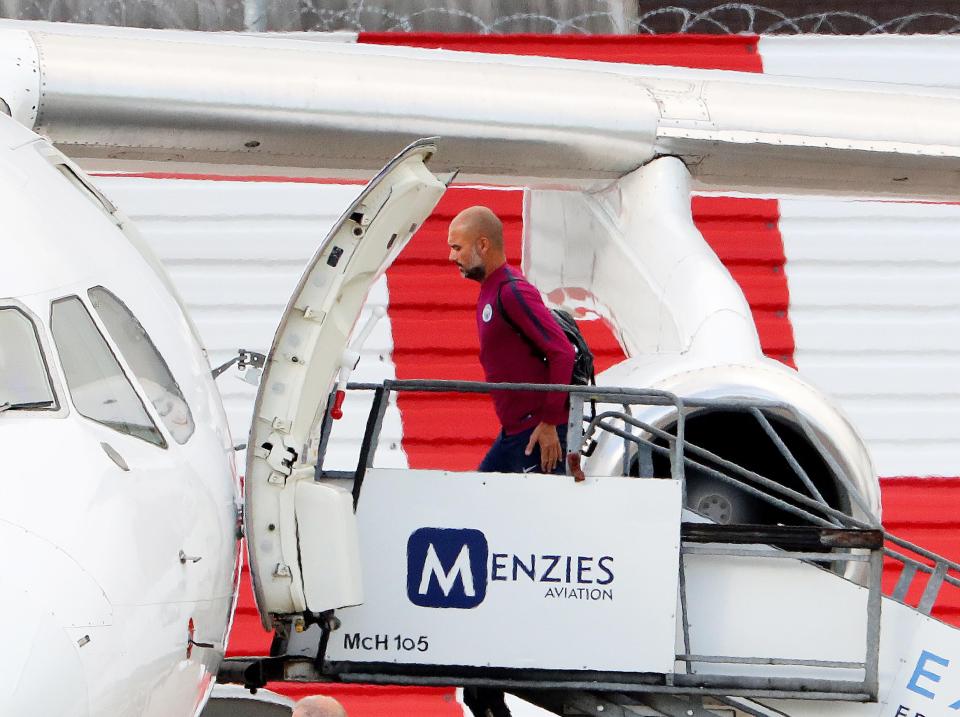 Blues chief Pep Guardiola marches onto the plane