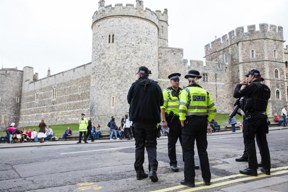  Officers on patrol outside the royal residence at Windsor Castle