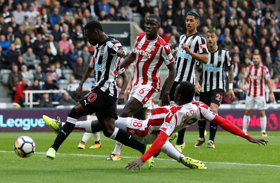 Christian Atsu steadies himself before firign the Newcastle opener on 19 minutes