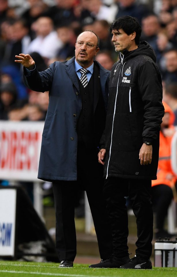 Rafa Benitez looks like he has never been away on his return to the touchline following hernia surgery