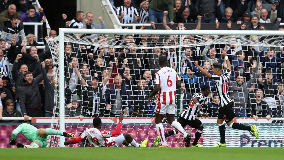 Christian Atsu wheels away after converting a cross from fellow Toon star Matt Ritchie