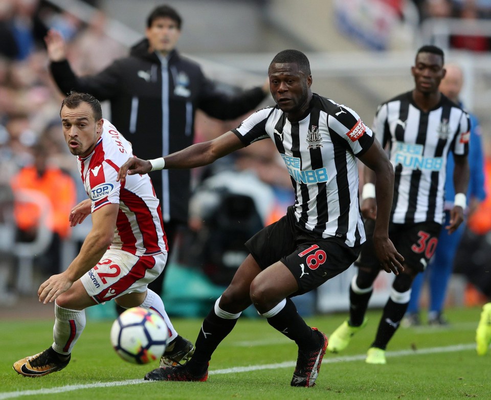 Chancel Mbemba gets the better of Stoke's Swiss midfielder Xherdan Shaqiri 