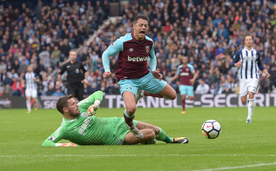 Ben Foster escaped with a yellow card after his rash challenge on Javier Hernandez