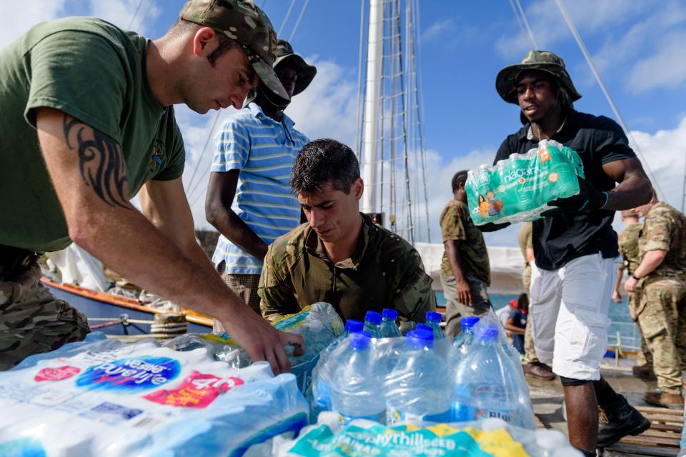  Sixty tonnes of aid have arrived - but now workers face a second Category Five in just a week