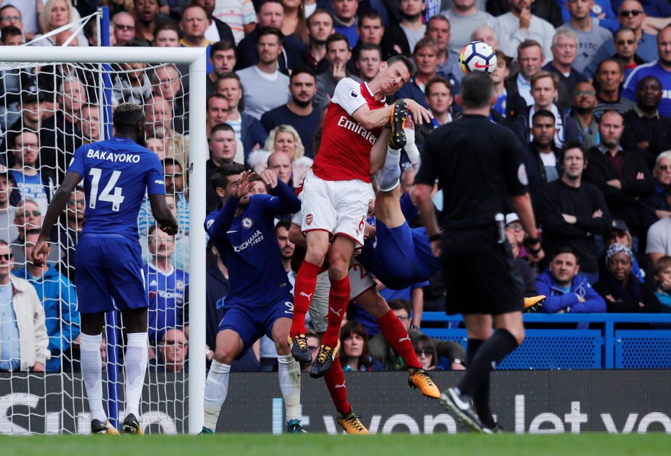 David Luiz was lucky not to be sent off for his high kick on Laurent Koscielny