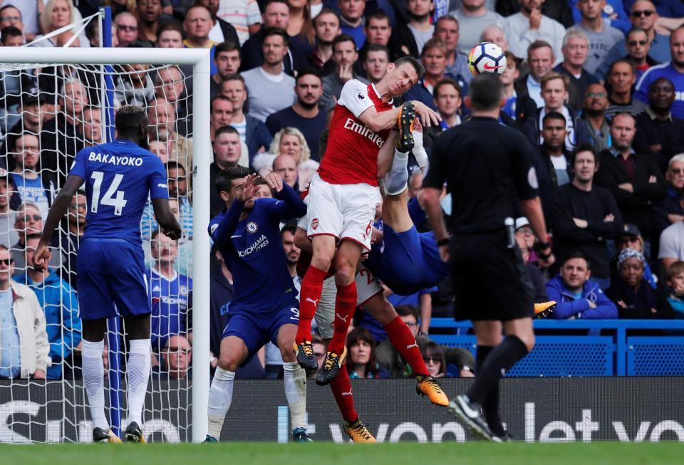  David Luiz was lucky not to be sent off for his high kick on Laurent Koscielny