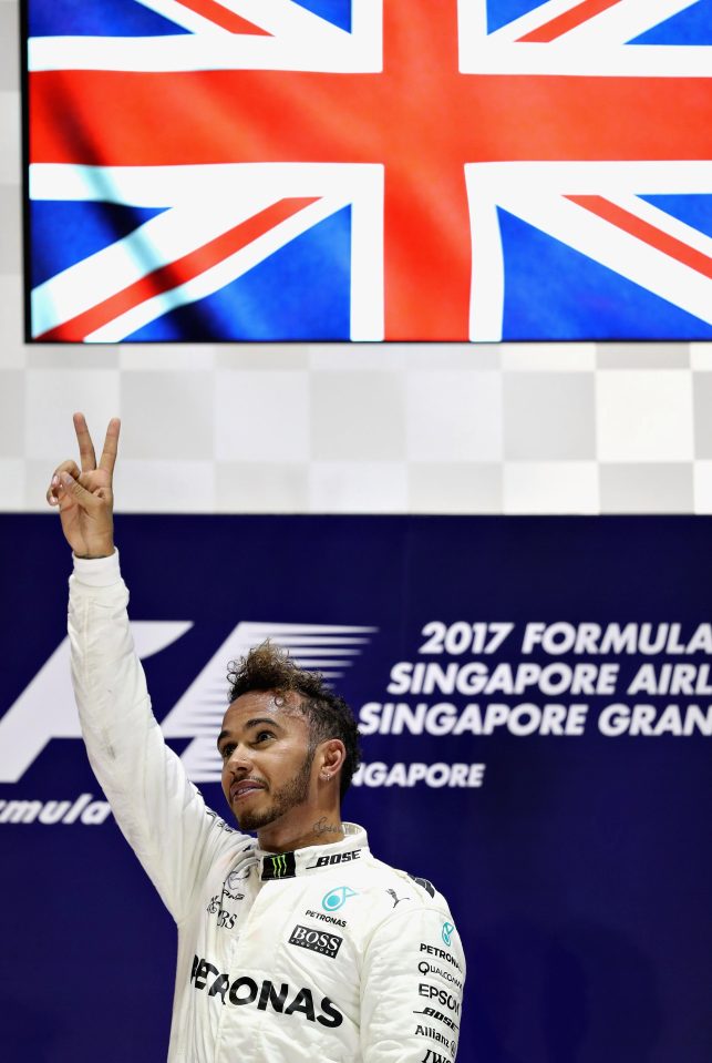  Lewis Hamilton celebrated winning the Singapore Grand Prix in thrilling style