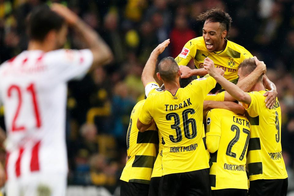  The Dortmund squad celebrate the 5-0 thrashing