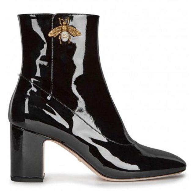  Gucci’s offering, pictured, is made from patent leather, whereas New Look’s boots have a soft satin finish