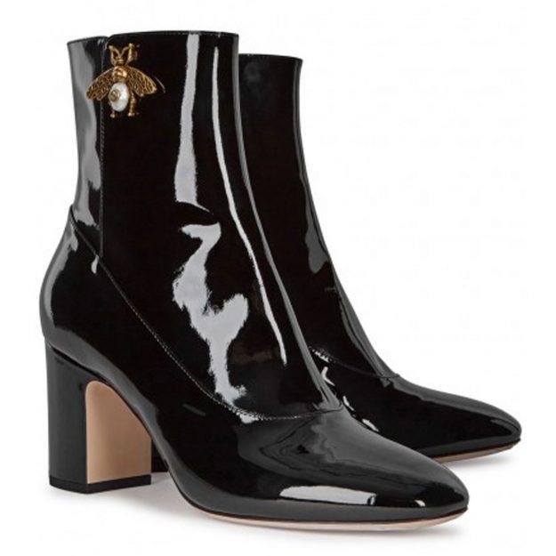  Gucci is currently selling a beautiful pair of black patent ankle boots which come with a gold tone bee plaque for £805