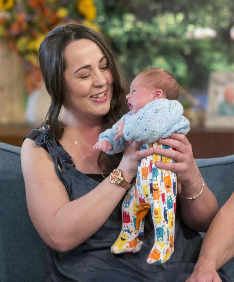  Lynette Gillard proudly shows off baby Seth George Hart