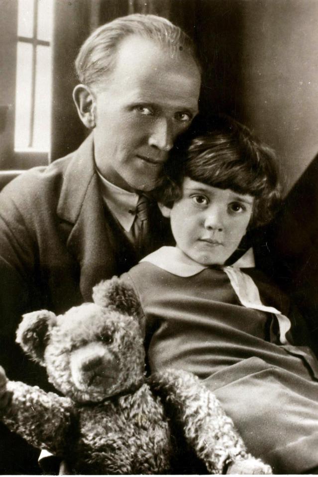  AA Milne with his son Christopher Robin, who inspired the books