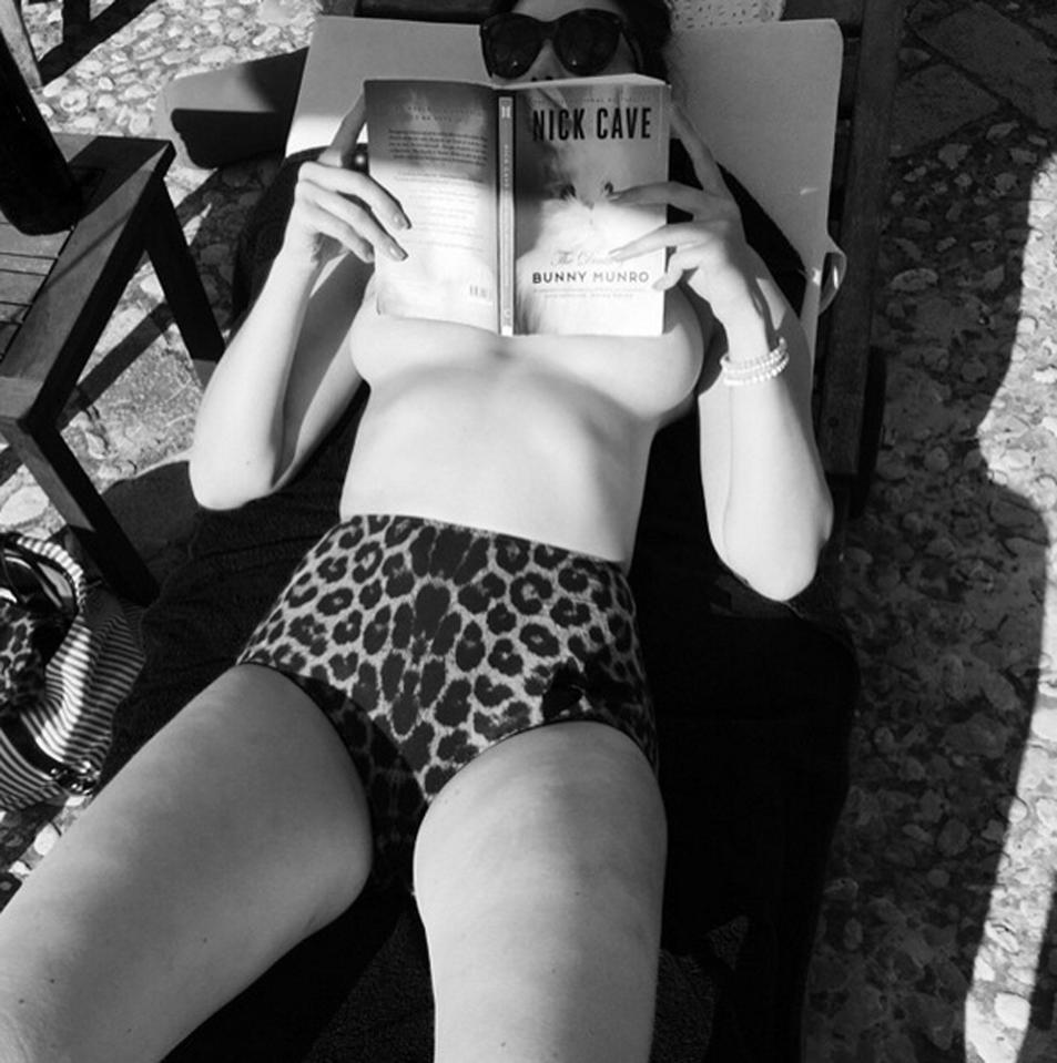  A risque Twitter snap sees Daisy enjoying a bit of topless reading