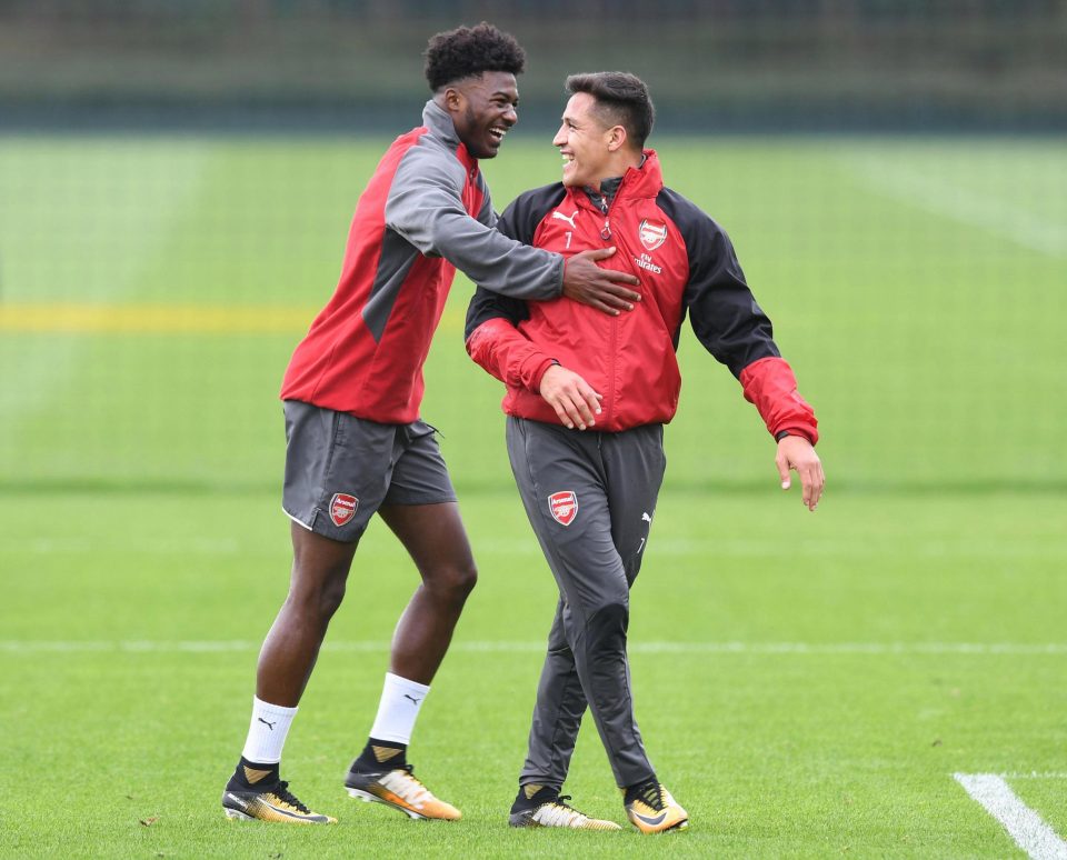  Sanchez with Arsenal youngster Ainsley Maitland-Niles