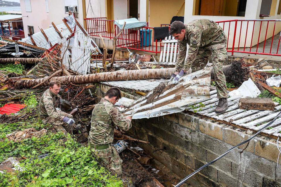  Brit troops clearing debris from a storm drain before Maria arrives on Tortola