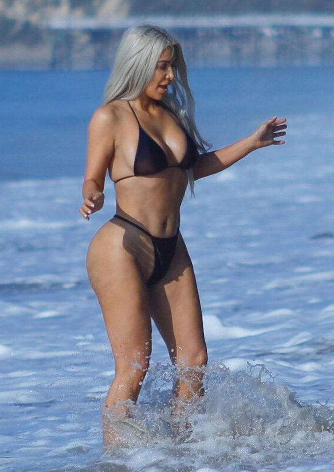  The reality star was spotted splashing about in the sea during her sun break