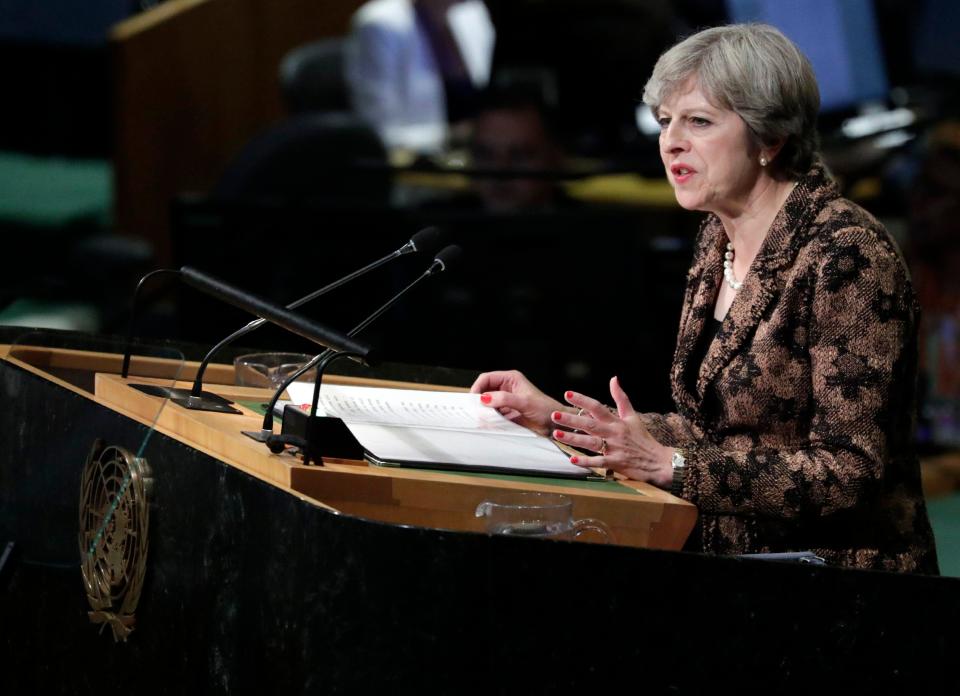  Theresa May said that the only way to take on new challenges in the world is to come together