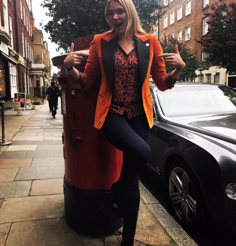 Model Jodie Kidd poses in a orange blazer as part of the Help for Heroes campaign