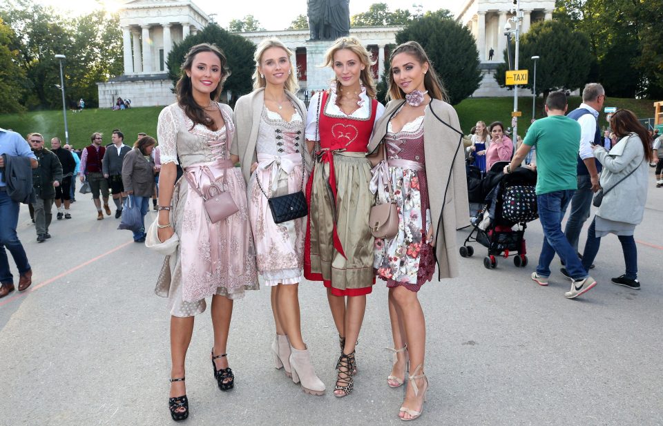 Blogger Laura Noltemeyer, Marco Reus' girlfriend Scarlett Gartmann, model Mandy Bork, and Mario Gotze's fiancee Ann-Kathrin Brommel at Oktoberfest