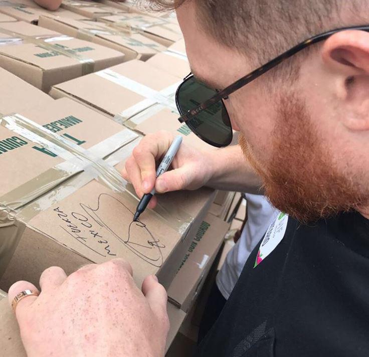  Canelo was even signing some of the aid packages he was handing out