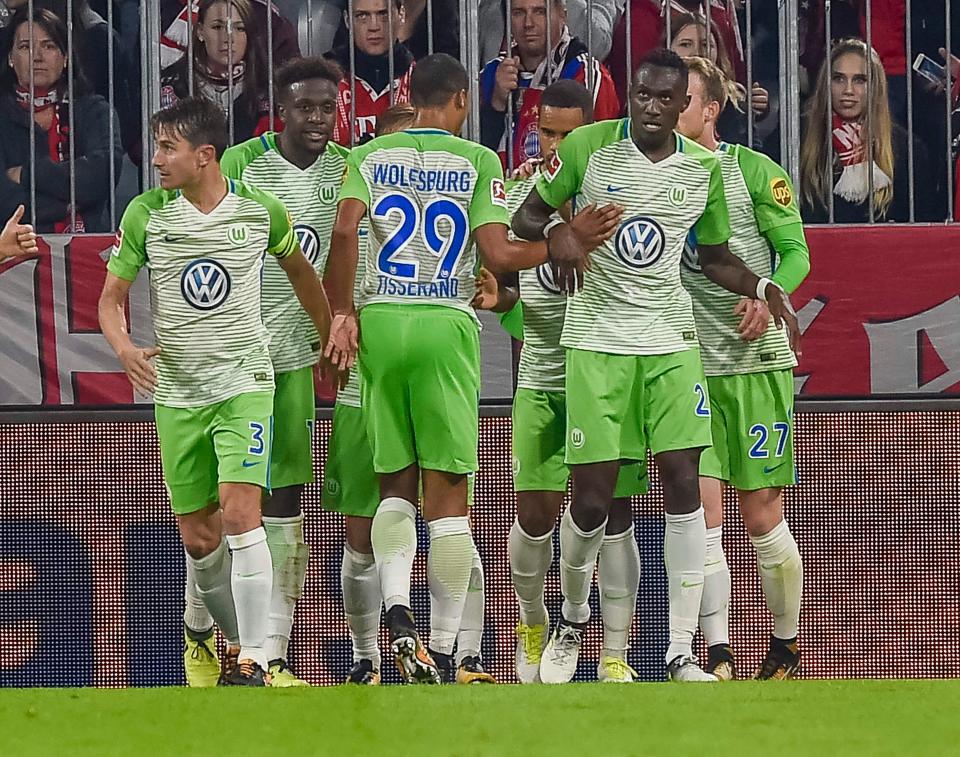  Wolfsburg scored a dramatic late header to snatch a point