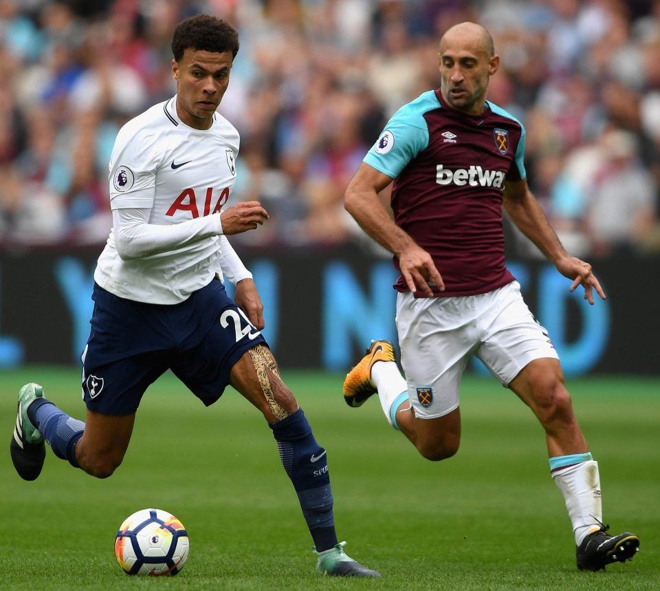 Alli attempts to get away from Pablo Zabaleta at the London Stadium