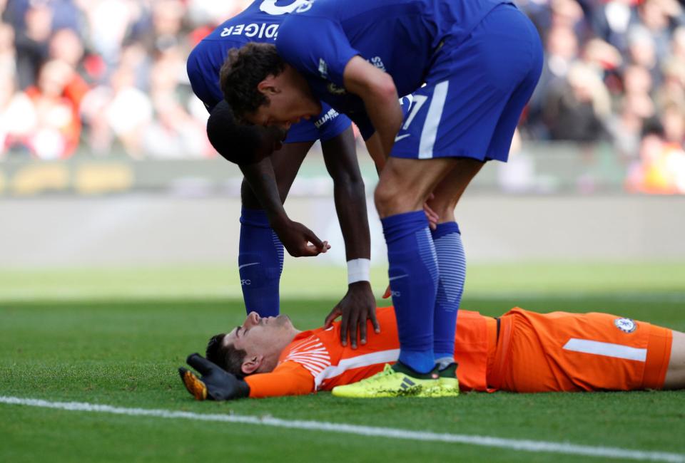 Blues stopper Thibaut Courtois played on, despite appearing to be knocked out