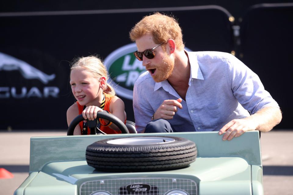  Harry looked to be enjoying himself in the miniature car