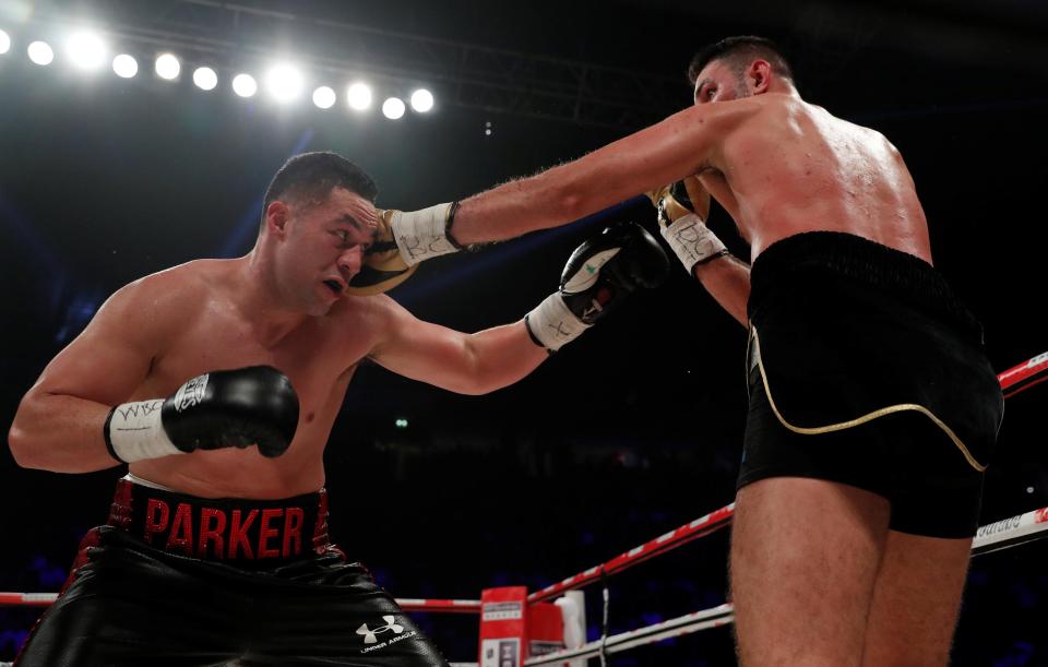 Hughie Fury tries to keep Joseph Parker at arm's length in Manchester