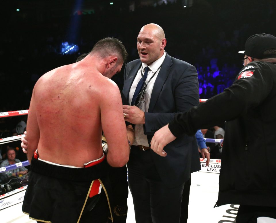 Hughie Fury is consoled by his cousin Tyson Fury after his world title dreams came crashing down