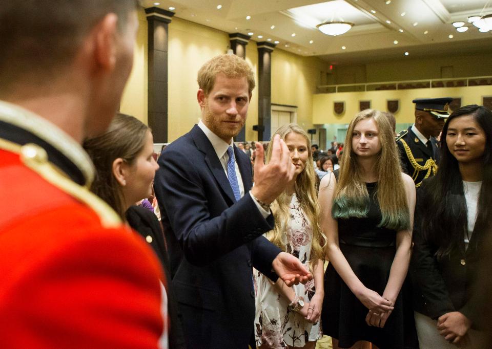  Prince Harry in Toronto speaking to recipients of medals at The Duke of Edinburgh Awards in Toronto, Canada. The Prince has been directly targeted in an ISIS video