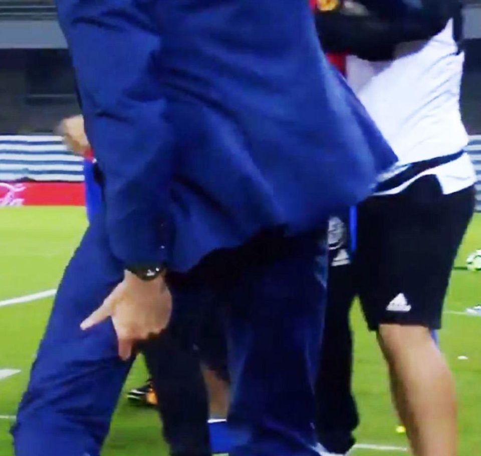  Marcelino reacts to the pain after tweaking his hamstring